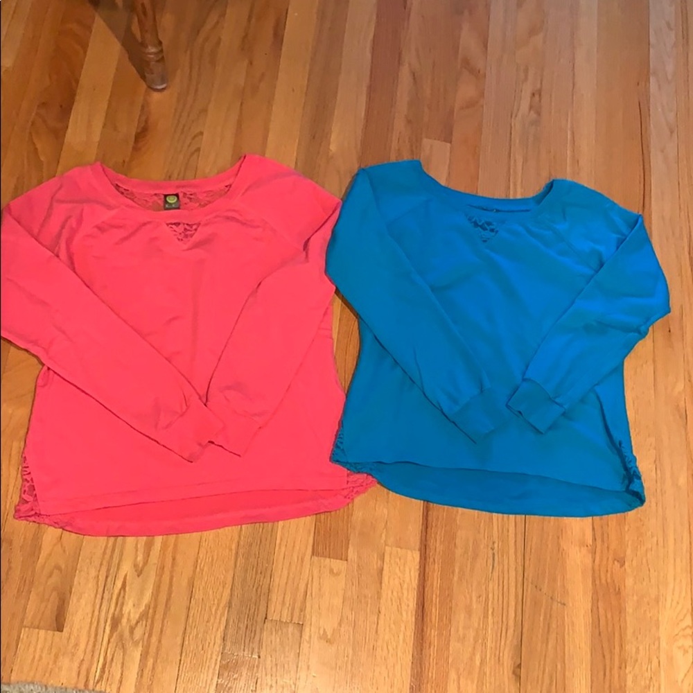2 Size L shirts with lace trim. High/Low style.
